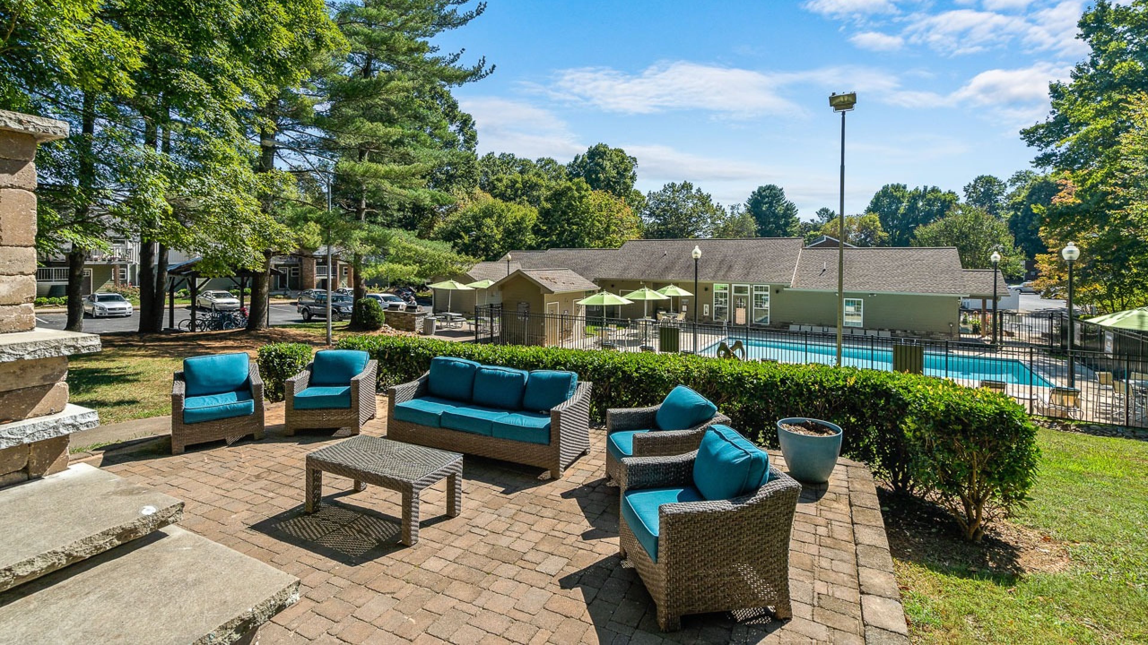 Hawthorne at Bear Creek outdoor amenity area with large patio overlooking the outdoor pool